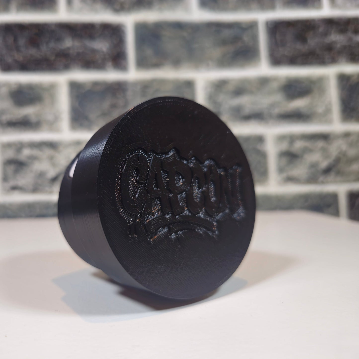 CAPCON – Outline BWD - Black (White Dot)